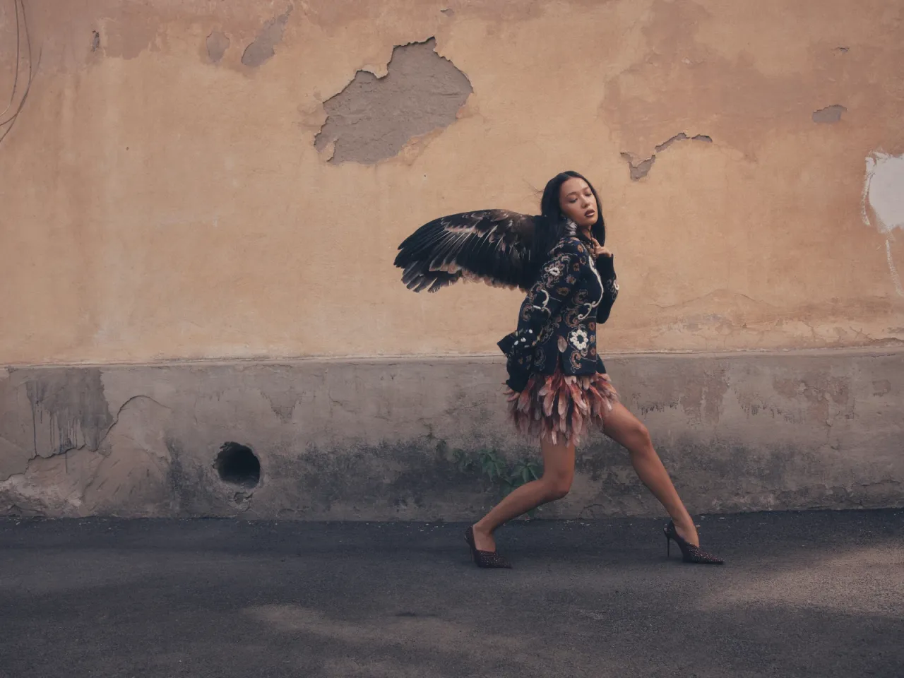 Платье Akhmadullina
Крылья IIya Migmoon 
Свитер Sacai (Saks Fifth Avenue Almaty)
Туфли Gadebe (Saks Fifth Avenue Almaty)