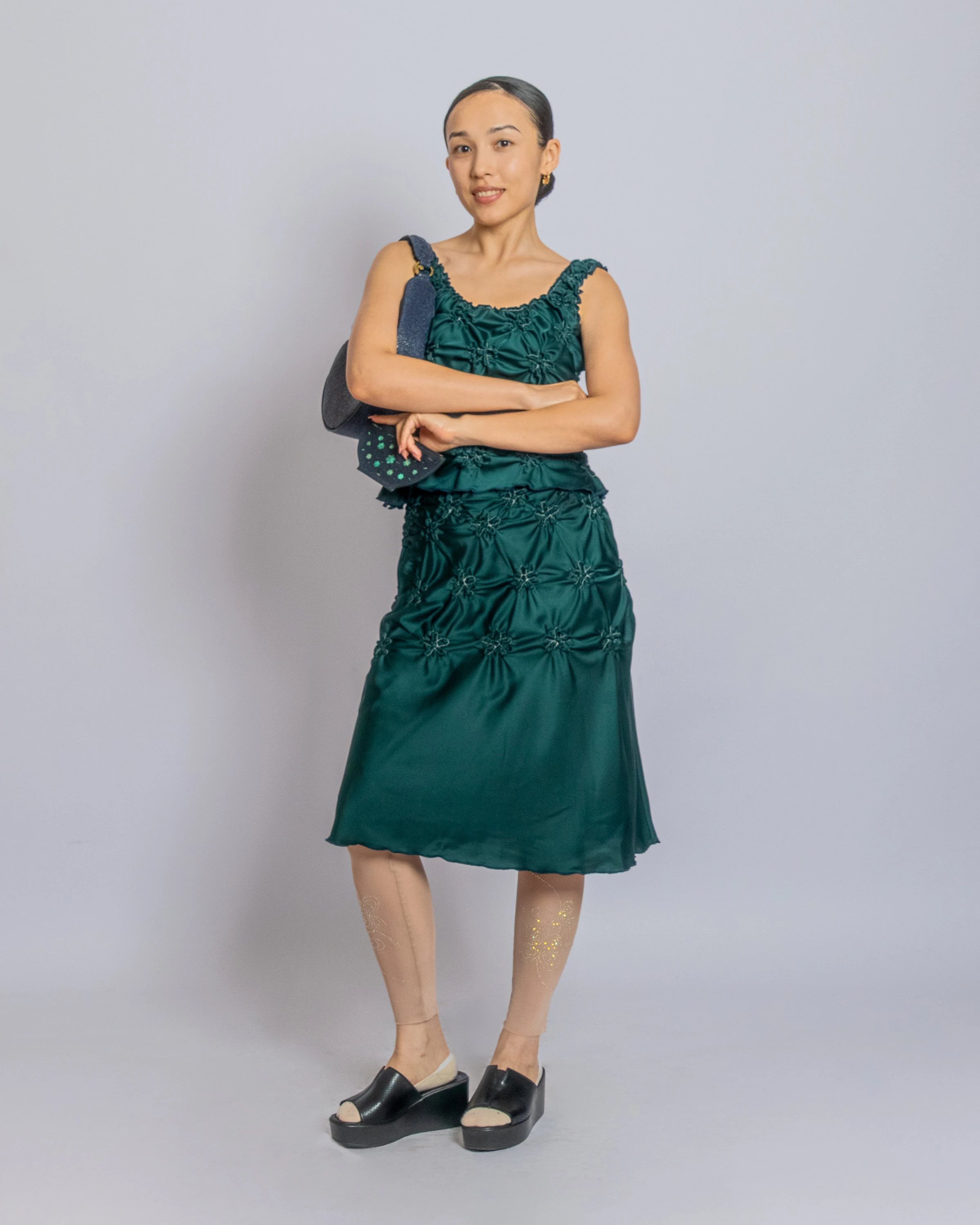 J.KIM FW 2026 көрсетіліміндегі модельдер мен музалардың автопортреттері