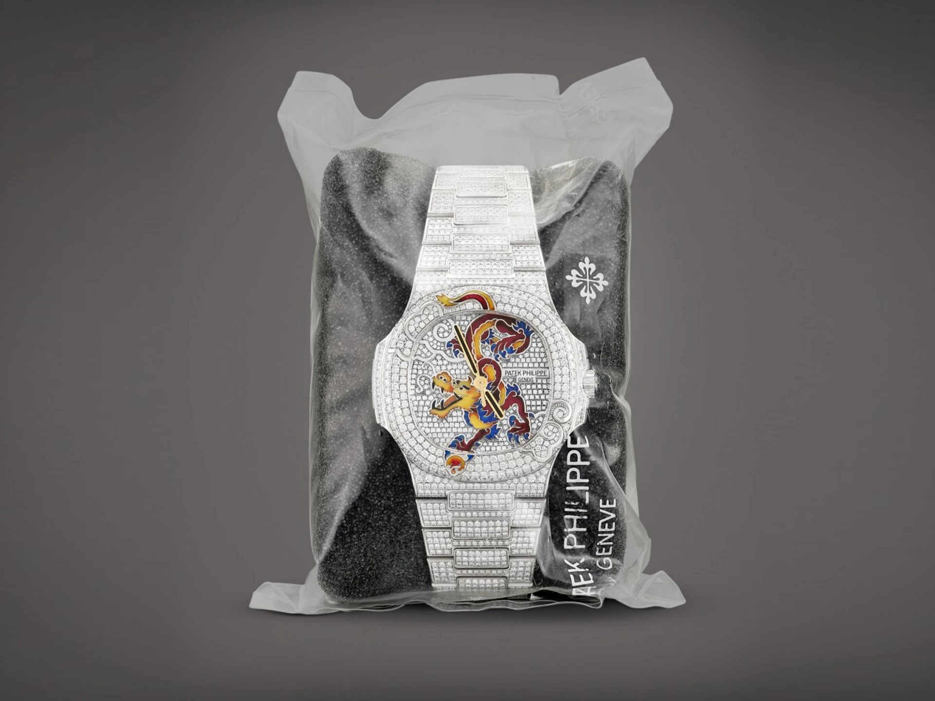 Patek Philippe Nautilus Reference 5720 White Gold, Diamond, and Enamel Circa 2012, 5,715,000 HKD